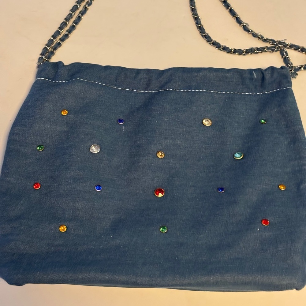 BLUE DENIM CROSSBODY BAG WITH COLORFUL CRYSTAL LIKE STUDS ON FRONT OF BAG